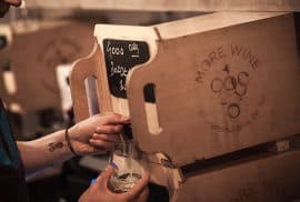 Why we should drink more wine on tap - Artilce image - pouring glass of wine from wine box